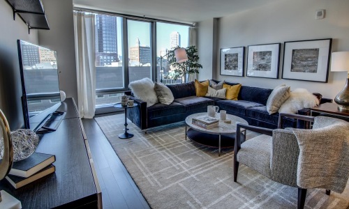 spacious living room with private balcony access